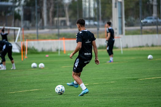 soccer players practicing passing drills