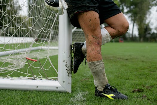 soccer player scoring a goal