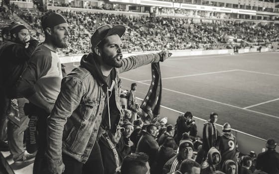 fans participating in soccer rituals