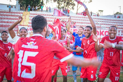 soccer players celebrating a goal after a successful counterattack