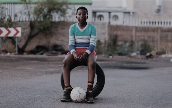 kids practicing soccer drills at home