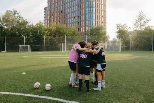 soccer players warming up before a game