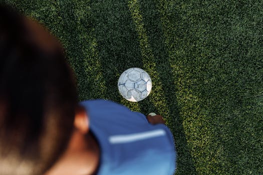 Soccer player focusing on the ball