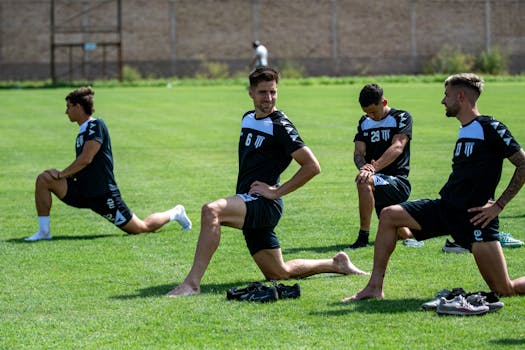 soccer players training on the field