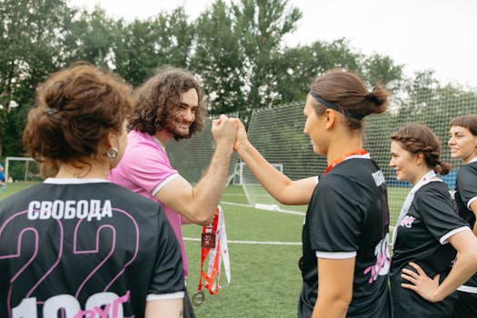 soccer team celebrating a goal