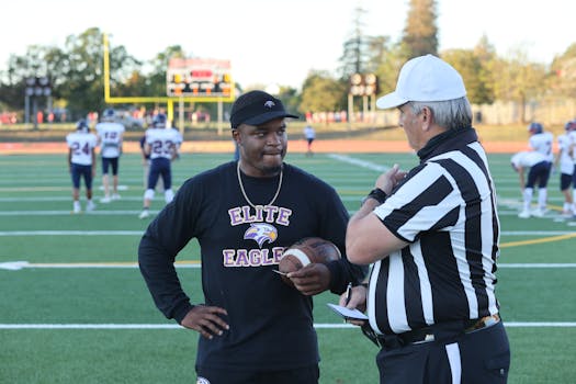 Referee explaining penalty rules