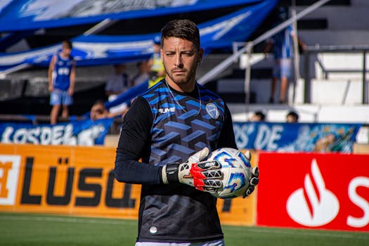 Soccer player adjusting shin guards