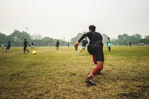 soccer player passing ball