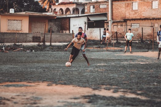 players engaging in soccer tennis