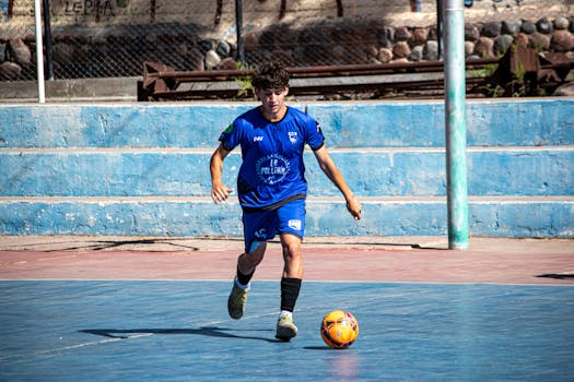 Soccer player practicing basic dribbling techniques