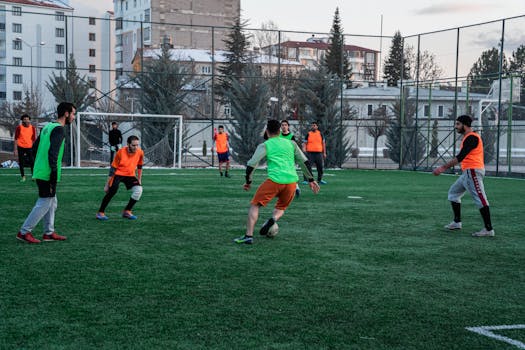 Amateur soccer match showing teamwork